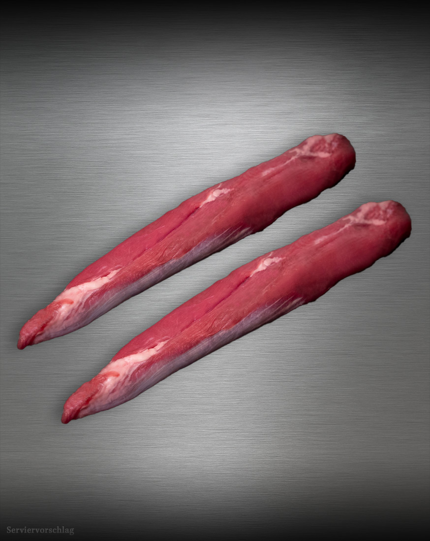 Lammfilet aus Neuseeland – grasgefüttertes Premiumfleisch Zartes Lammfilet aus Neuseeland auf metallischem Hintergrund