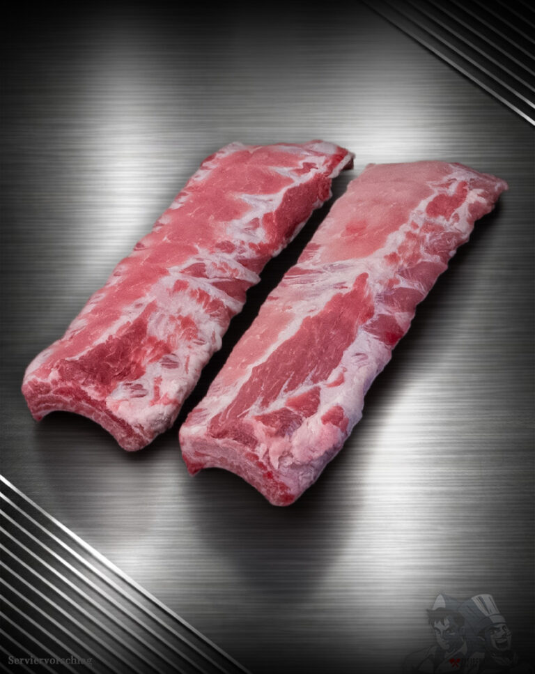 Baby Back Ribs (Kotelettrippen) vom Duroc-Schwein roh auf Steinplatte