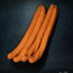 XXL Bockwurst vom Duroc aus der traditionellen Berliner Dampfriemen Herstellung aus 180g regionalem Duroc Schwein aus Berlin Brandenburg saftig aromatisch und handwerklich gefertigt