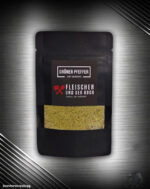 Schale mit grünem Pfeffer Dip und Pfefferkörnern