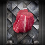 Athleten Kalbsfilet natur aus dem Fläming, fein pariert und roh auf dunklem Untergrund