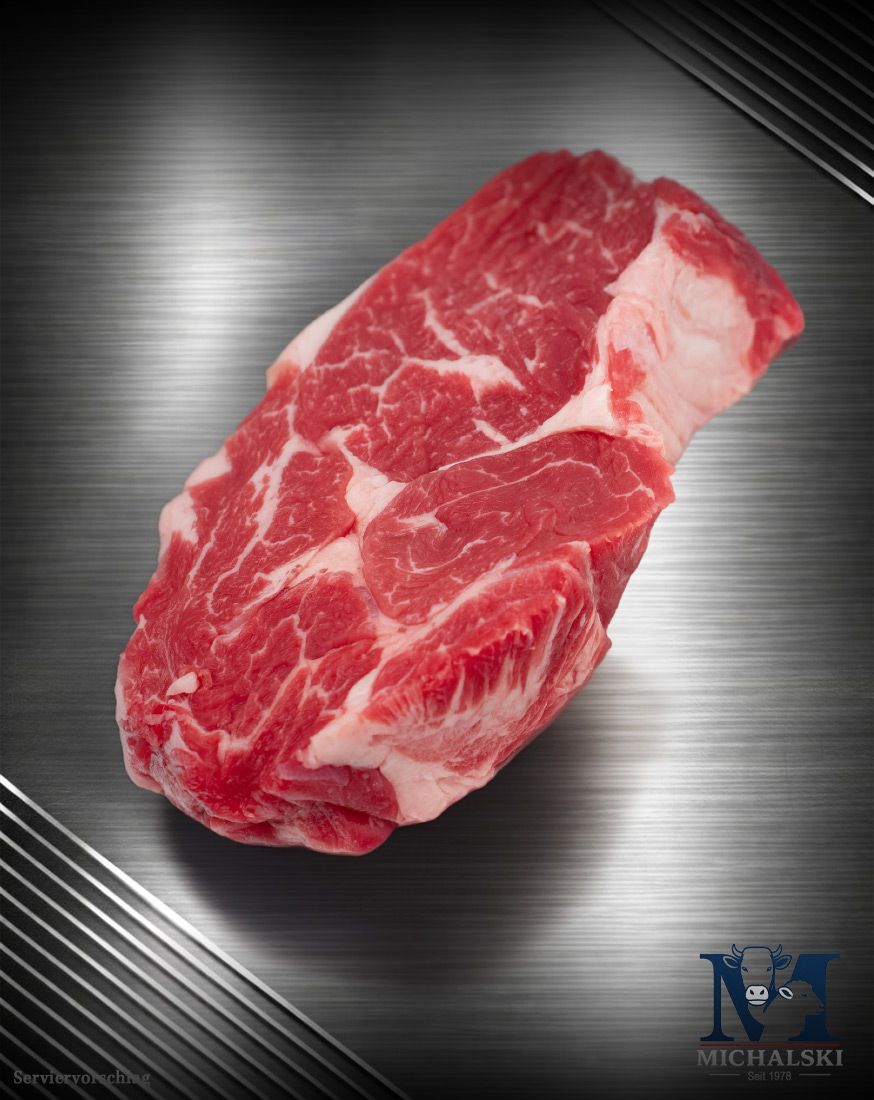 RMichalski Ribeye Steak von der Weidefärse roh Michalski Ribeye Steak von der Weidefärse roh mit sichtbarem Fettauge und feiner Marmorierung